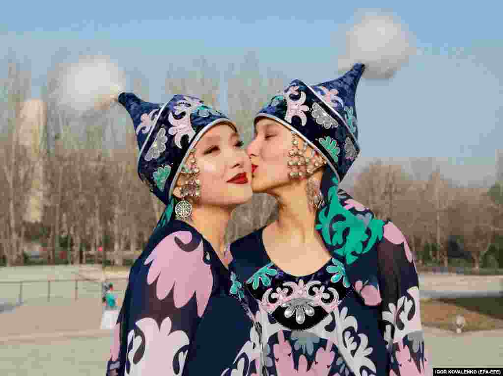 Kyrgyz women wearing traditional costumes celebrate at&nbsp; Ala-Too Square in Bishkek.