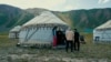 Young Kyrgyz mother's yurt camp on Central Asia's highest peak 