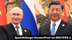Президент Росії Володимир Путін і президент Китаю Сі Цзіньпін під час зустрічі у Пекіні, Китай, 18 жовтня 2023 року
