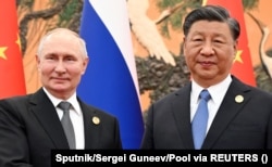 Presidenti rus, Vladimir Putin dhe ai kinez, Xi Jinping, duke marrë pjesë në një takim në margjina të Forumit Brezi dhe Rruga. Pekin, 18 tetor 2023.