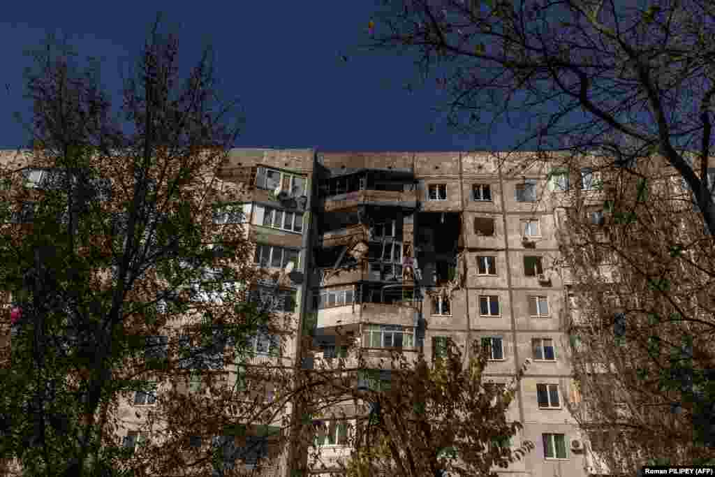A damaged apartment building in Kherson Russian forces have maintained their hold on the eastern bank of the Dnieper River, which passes through Kherson, and continue to pound positions in the city,&nbsp;often targeting critical infrastructure and killing civilians. &nbsp;