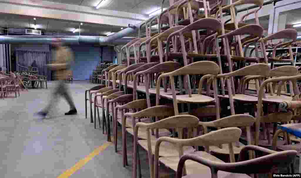 This stack of designer chairs in the Artisan furniture factory in Tesanj, in northern Bosnia, represents an unexpected economic boon that Bosnia-Herzegovina is enjoying, largely as a result of the recent coronavirus pandemic.