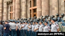 Armenia - Riot police guard the main government building in Yerevan, May 30, 2024.