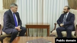 Armenia - Armenian Foreign Minister Ararat Mirzoyan (right) meets Russian Deputy Foreign Minister Andrei Rudenko, Yerevan, April 11, 2023.