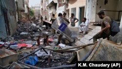 ویرانی های ناشی از حمله به کلیسا ها و منطقه مسیحی نشین در شهر فیصل آباد پاکستان 