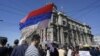 Banners saying "No to capitulation," "Serbia remembers," and "Resignation to Vucic" were unfurled in front of the government's headquarters.