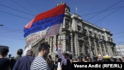 Banners saying "No to capitulation," "Serbia remembers," and "Resignation to Vucic" were unfurled in front of the government's headquarters.