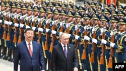 رؤساي جمهور چین و روسیه به گونه مشترک از عمل‌کرد امریکا در قبال این دو کشور انتقاد کردند.