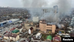 Smoke from fire caused by an explosion rises above a building belonging to the border patrol section of Russia's FSB federal security service in the city of Rostov-on-Don, Russia, on March 16.