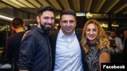 Armenia - Parliament speaker Alen Simonian (center), his brother Karlen and sister-in-law Ani Gevorgian.