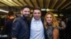 Armenia - Parliament speaker Alen Simonian poses for a photo with his brother Karlen and sister-in-law Ani Gevorgian.