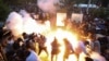 Armenia - A police stun grenade explodes during a rally against Prime Minister Nikol Pashinian in Yerevan, June 12, 2024. (Vahram Baghdasaryan/Photolur via AP)