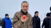 This image from February 4, 2023, image shows a newly released Ukrainian soldier holding an apple for the first time after a year of captivity. <a href="https://www.instagram.com/p/CoUYo45Kpy2/?hl=en">Video of the moment</a> shows the man shaking his head in disbelief as he bites into the fruit.<br />
<br />
The image is one of scores of photos of prisoner releases made over the past year, many taken at unspecified locations in Ukraine, showing the raw emotion of men and women being returned from the purgatory of imprisonment and into the arms of their loved ones.