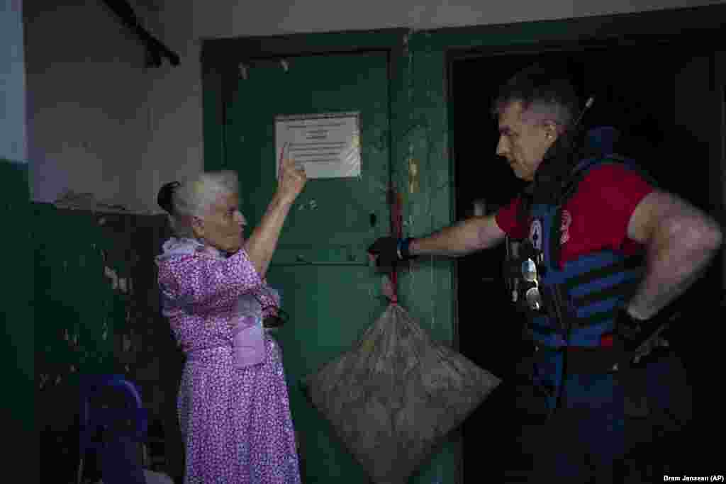 An elderly woman tells&nbsp;Kyrychenko that she does not want to be evacuated from her home. &nbsp;