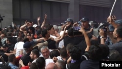 Armenia - Riot police clash with antigovernment protesters outside the Foreign Ministry building in Yerevan, May 31, 2024.