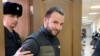 Ilya Baburin appears in court.
