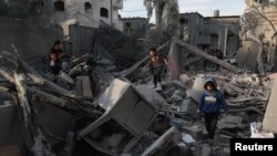 Последици от израелски удар над сграда в град Рафах, 12 февруари 2024 г.
