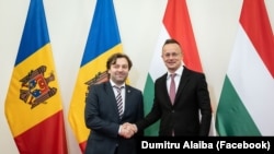 Dumitru Alaiba, ministrul Dezvoltării Economice și Digitalizării și Péter Szijjártó, ministrul Afacerilor Externe și al Comerțului, la Budapesta, Ungaria, 4 octombrie.