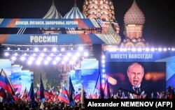 Президент России Владимир Путин на Красной площади во время выступления на митинге и концерте в честь аннексии четырех областей Украины, 30 сентября 2022 года