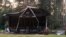One of two houses that were burned out in the Russian village of Derevyanoe this month in incidents that left half a dozen people dead.
