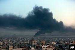 Gaza City/ Fâșia Gaza, joi, 26 octombrie, după un atac aerian israelian.