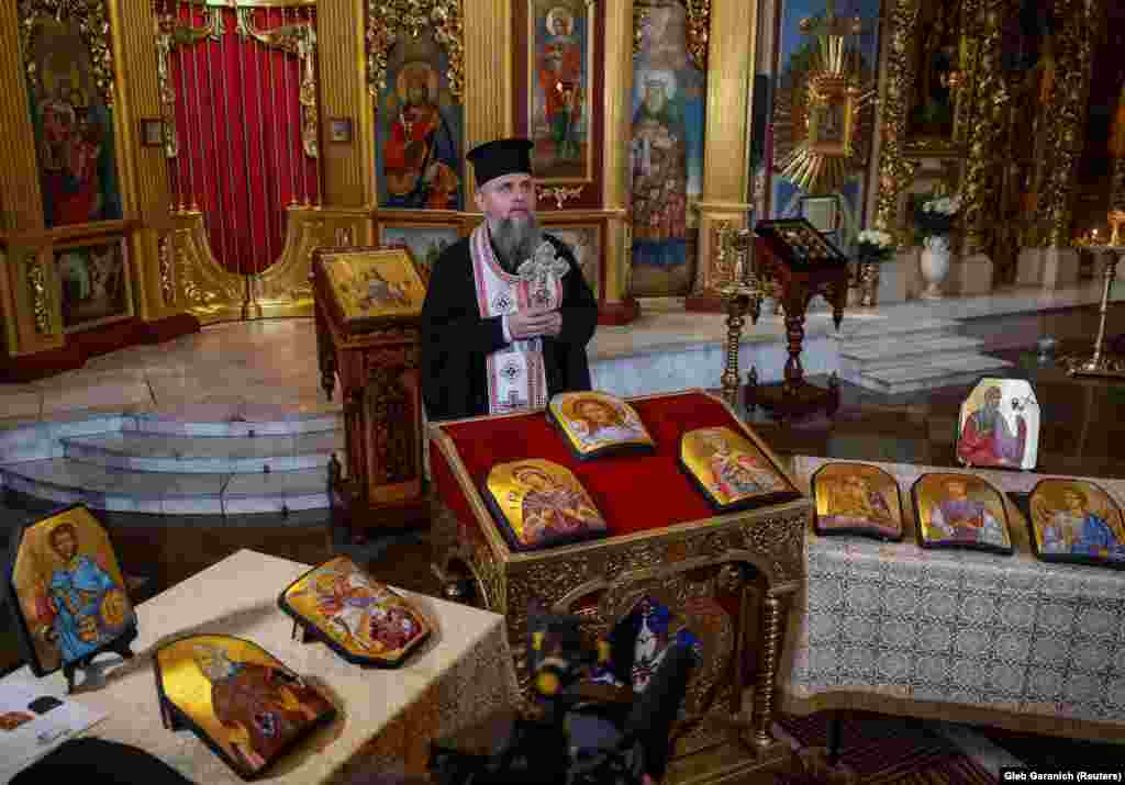 Metropolitan Epiphanius I, head of the Orthodox Church of Ukraine, leads the consecration ceremony for the blessing of Orthodox icons.