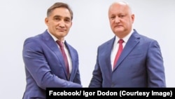 Alexandru Stoianoglo (left) and former Moldovan President Igor Dodon