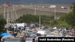 Беженцы из Карабаха выезжают в Армению, 29 сентября 2023 года
