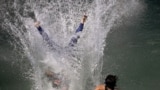 Pakistani&#39;s cool off at a water park in Lahore on May 26 during a heat wave.<br />
<br />
Authorities in Pakistan&#39;s Punjab Province are advising people to stay indoors as an intense heat wave is expected to last until early June.