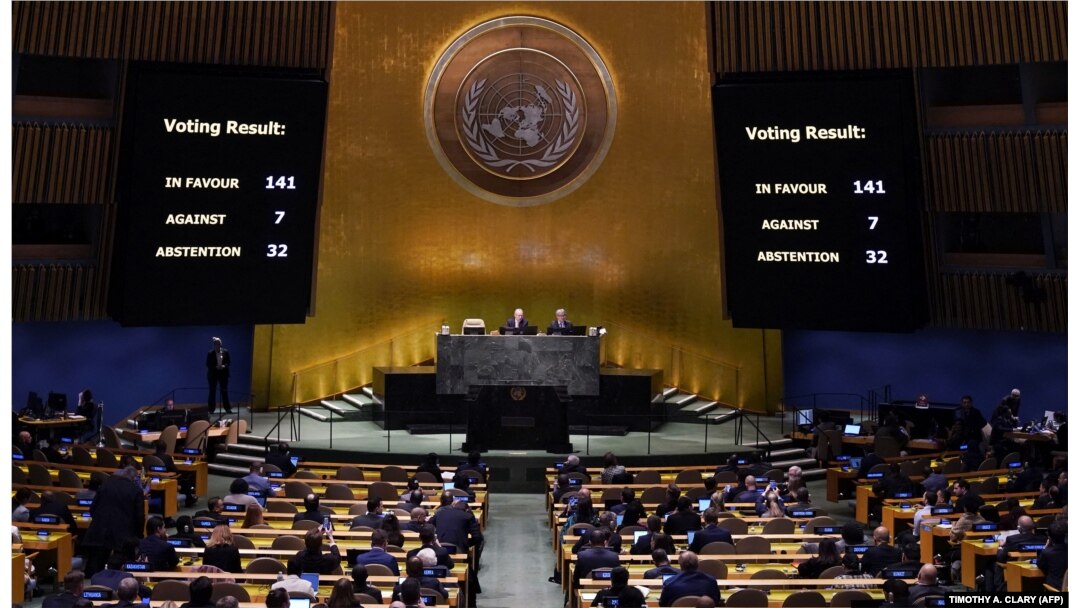 Screens display the vote count during the 11th Emergency Special Session of the General Assembly on Ukraine, at UN headquarters in New York City on February 23.