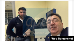 Russia - A lawyer for Azerbaijani man Kamil Zeynalli (left) takes a selfie with him following his arrest in Moscow, February 21, 2024.