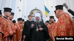 The head of the Orthodox Church of Ukraine, Metropolitan Epifaniy (center) said the move was "vitally necessary." 