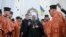 The head of the Orthodox Church of Ukraine, Metropolitan Epifaniy (center) said the move was "vitally necessary." 