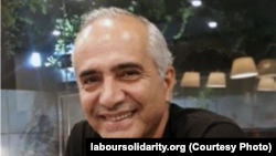 Iranian labor activist Davood Razavi. (file photo)