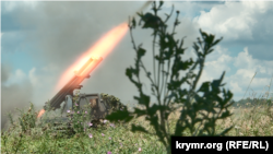 A Ukrainian Grad launcher fires rockets at Russian positions in the Zaporizhzhia region.