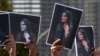 پوسترهای مهسا امینی در اعتراضات پس از مرگ او