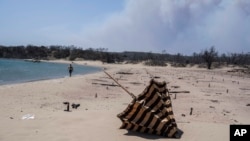 Plajă pârjolită de incendiu în sudul insulei Rodos, Grecia, luni 24 iulie 2023.