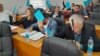 Members of the municipal council in Srebrenica vote on the proposal to rename the city streets.