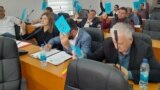 Members of the municipal council in Srebrenica vote on the proposal to rename the city streets.