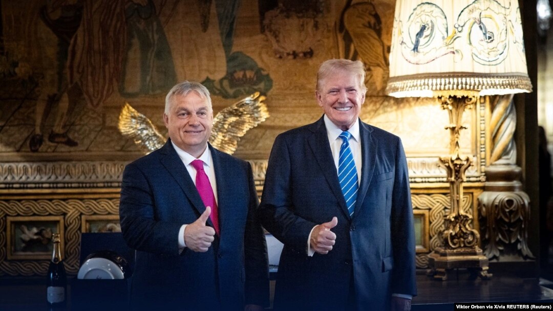 Hungarian Prime Minister Viktor Orban (left) meets Donald Trump at Trump's Mar-a-Lago home in Florida on July 11.