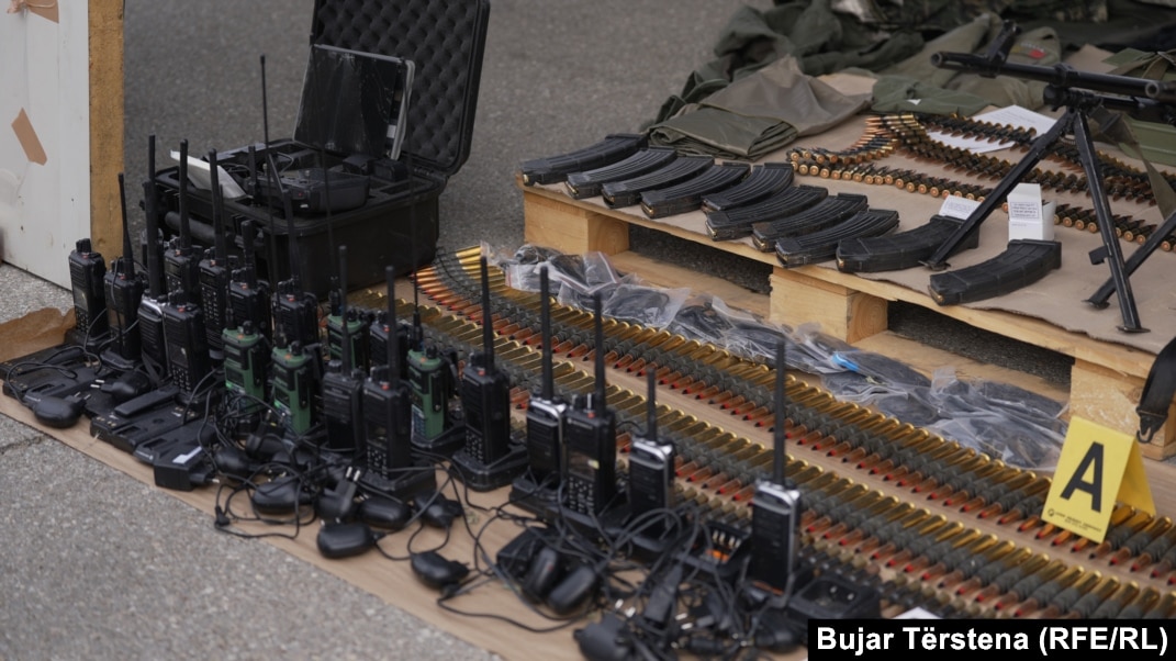 Kosovo Police Display Confiscated Weapons Following Monastery Attack