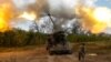 Ukrainian soldiers prepare to fire a 2C22 "Bohdan" self-propelled howitzer at Russian positions in eastern Ukraine.