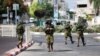 Izraelski vojnici nakon masovnog upada Hamasa iz Pojasa Gaze u izraelski grad Sderot, južni Izrael, 11. oktobar 2023. 