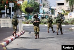 Ізраїльский патруль прочісує місто Сдерот, шукаючи бойовиків «Хамасу». 11 жовтня 2023 року