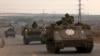سربازان اسرائیلی سوار بر خودروهای زرهی به سمت مرز اسرائیل با نوار غزه، ۲۴ مهر