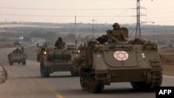 سربازان اسرائیلی سوار بر خودروهای زرهی به سمت مرز اسرائیل با نوار غزه، ۲۴ مهر