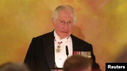 King Charles III attends a state banquet held by Frank-Walter Steinmeier at the Bellevue Palace in Berlin on March 29.