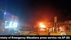 Меѓу загинатите се и две деца. Неименуван сведок изјавил дека пожарот избувнал на паркинг наспроти бензинската станица