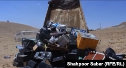 A pile of musical instruments and equipment to be burned on the outskirts of Herat.