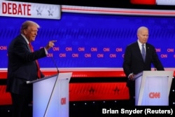 Данальд Трамп і Джо Байден (праворуч) під час дебатів